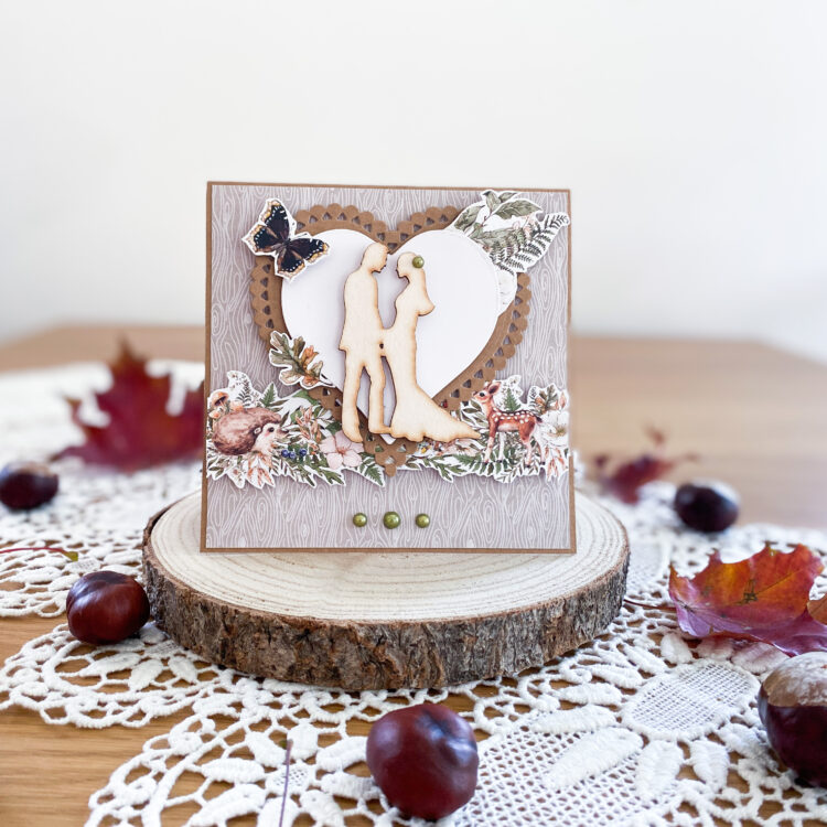 Ręcznie wykonana kartka ślubna w jesiennych kolorach i z leśnymi dekoracjami.